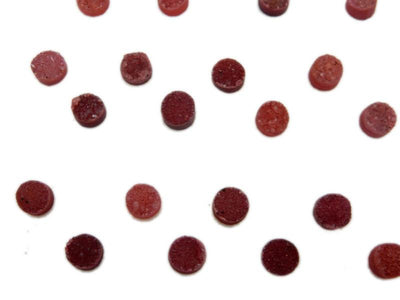 Up close shot of Red Round Druzy Pairs on white background