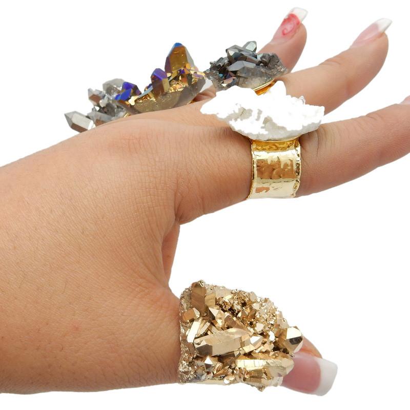 side view of crystal rings on a hand