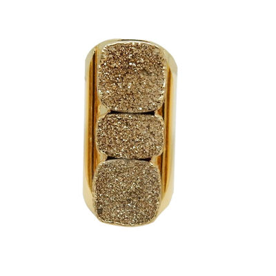close up of the gold druzy ring on gold cigar band 
