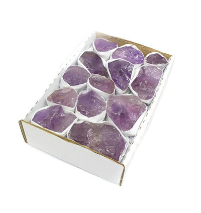 Box of Rough Amethyst on white background