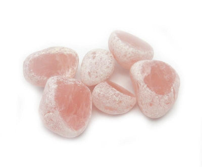 tumbled rose quartz seer stones on display for possible variations