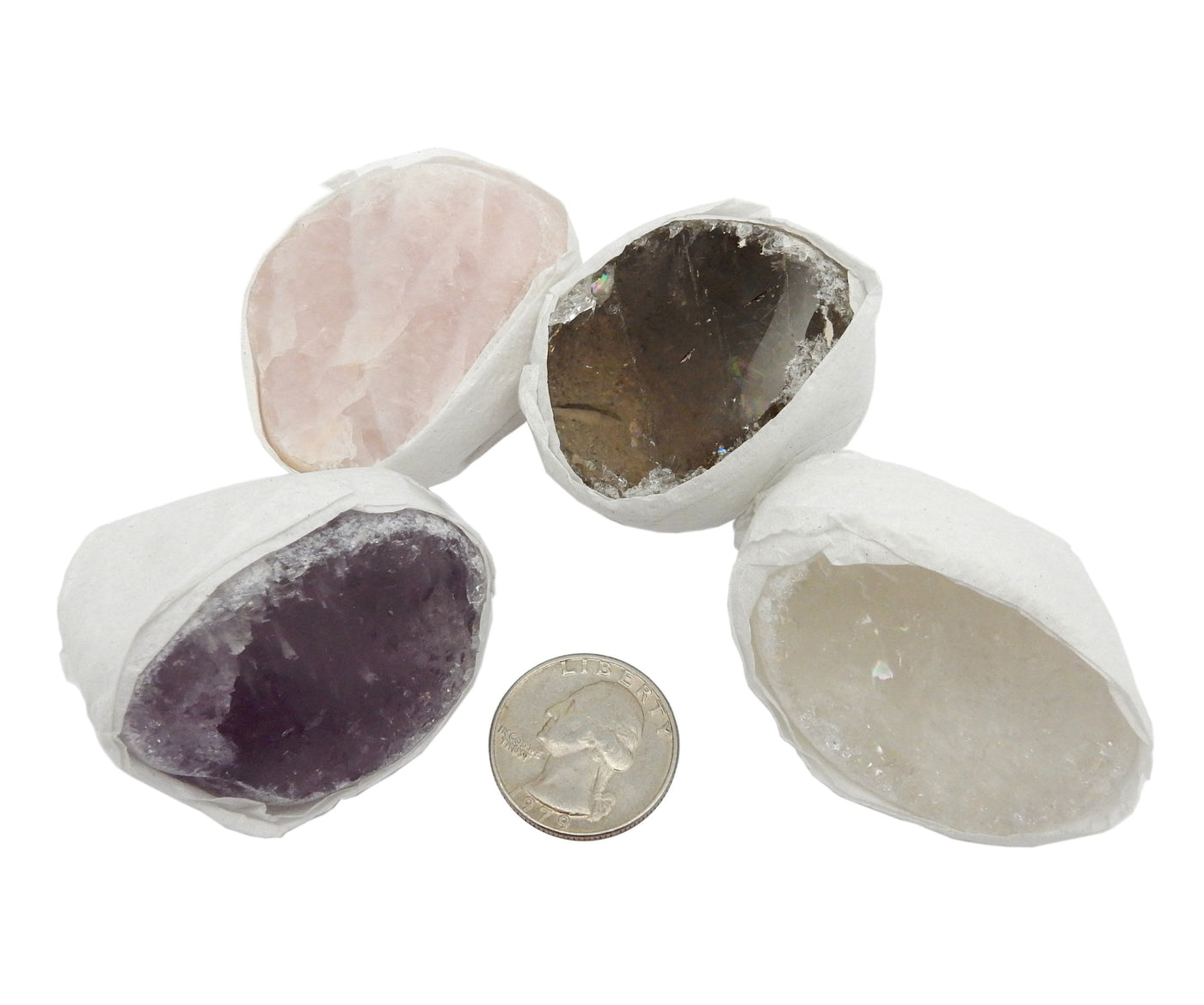 assorted seer stones with quarter for approximate size reference