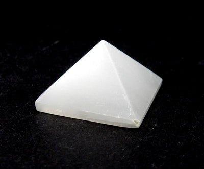 close up of one selenite pyramid for details