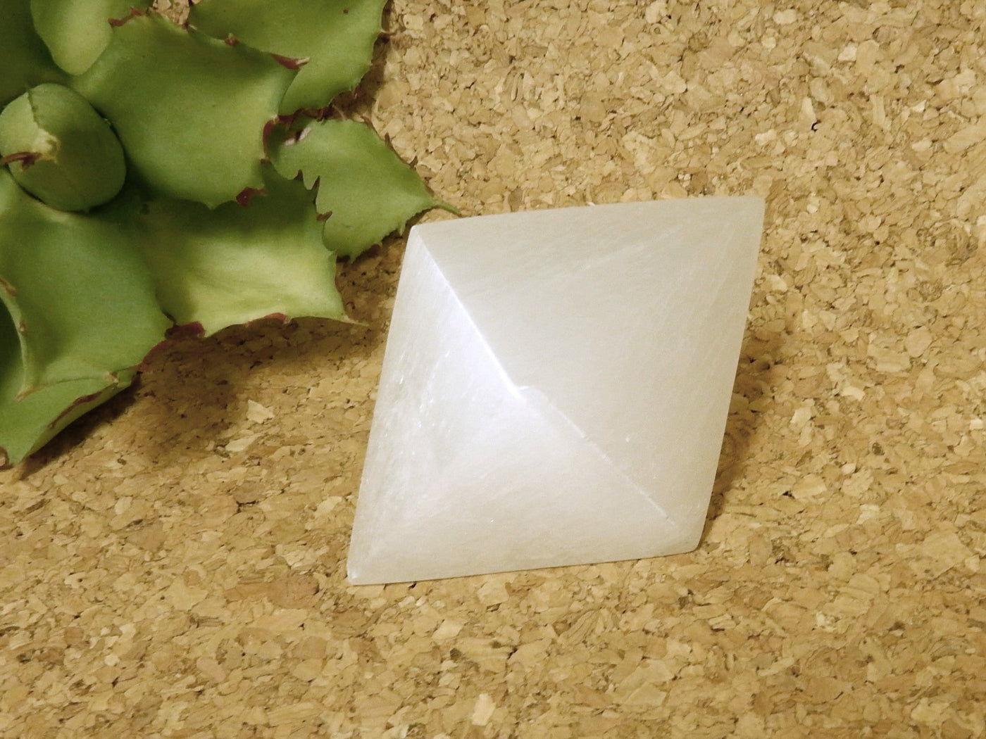 close up of selenite double pyramid for details