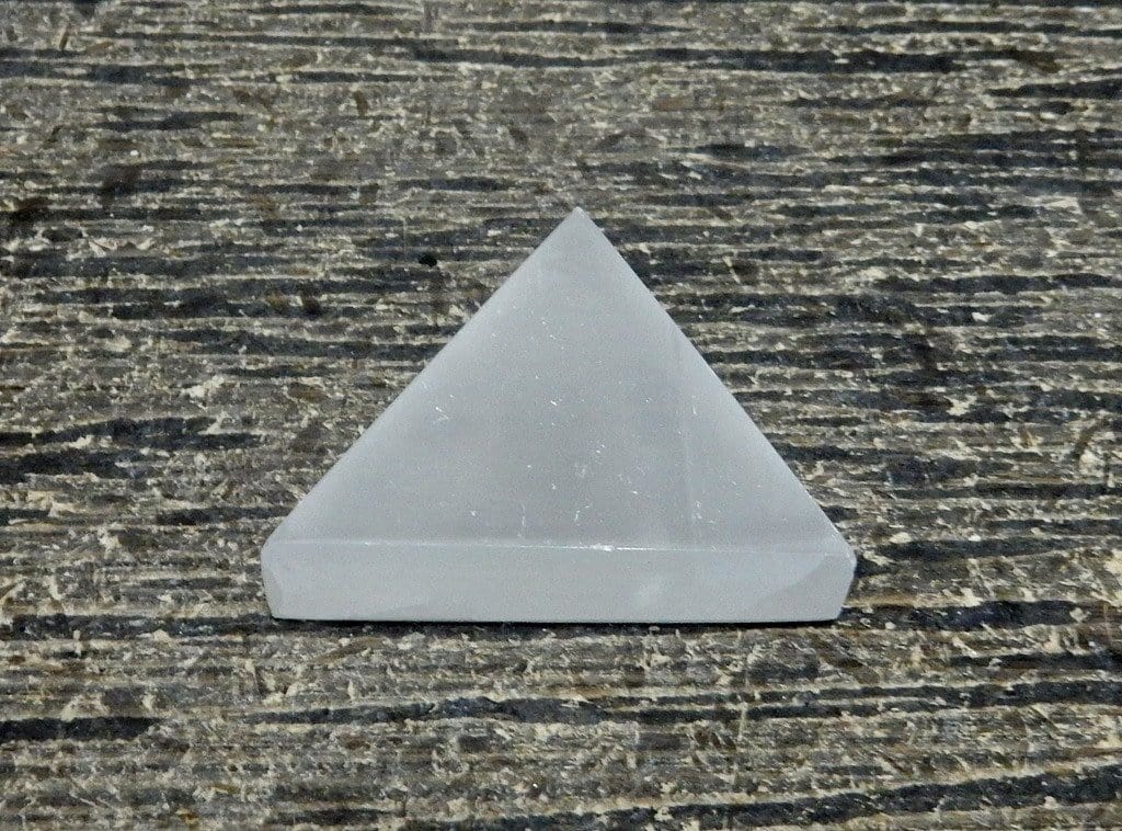 close up of one selenite triangle for details