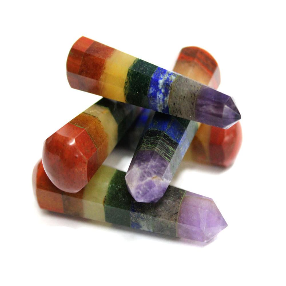 many seven chakra crystal tower obelisk points in a pile