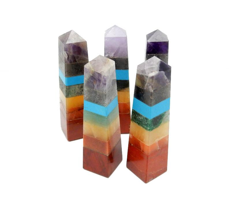 many seven chakra crystal tower points on display for possible variations