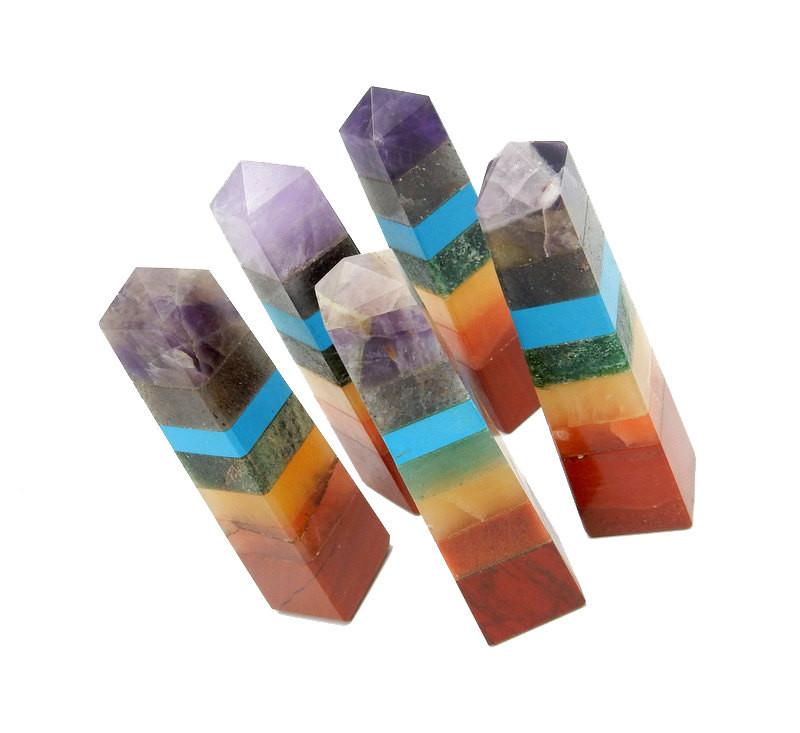 many seven chakra crystal tower points on display for possible variations