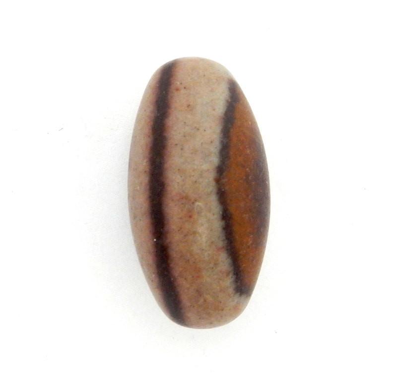 close up of one shiva lingam stone for details
