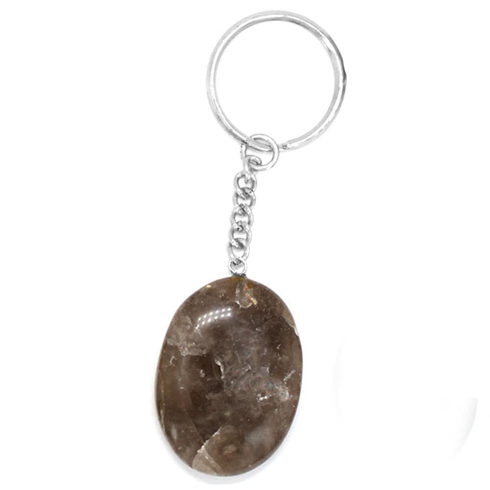 close up of one smokey quartz worry stone keychain on white background for details