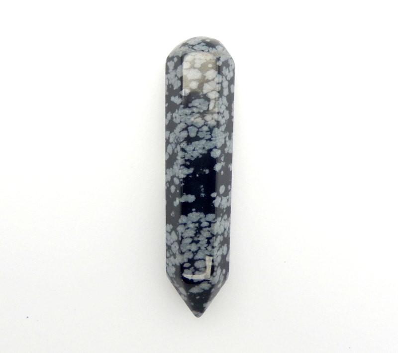 overhead view of one snowflake jasper point massage wand on white background for details