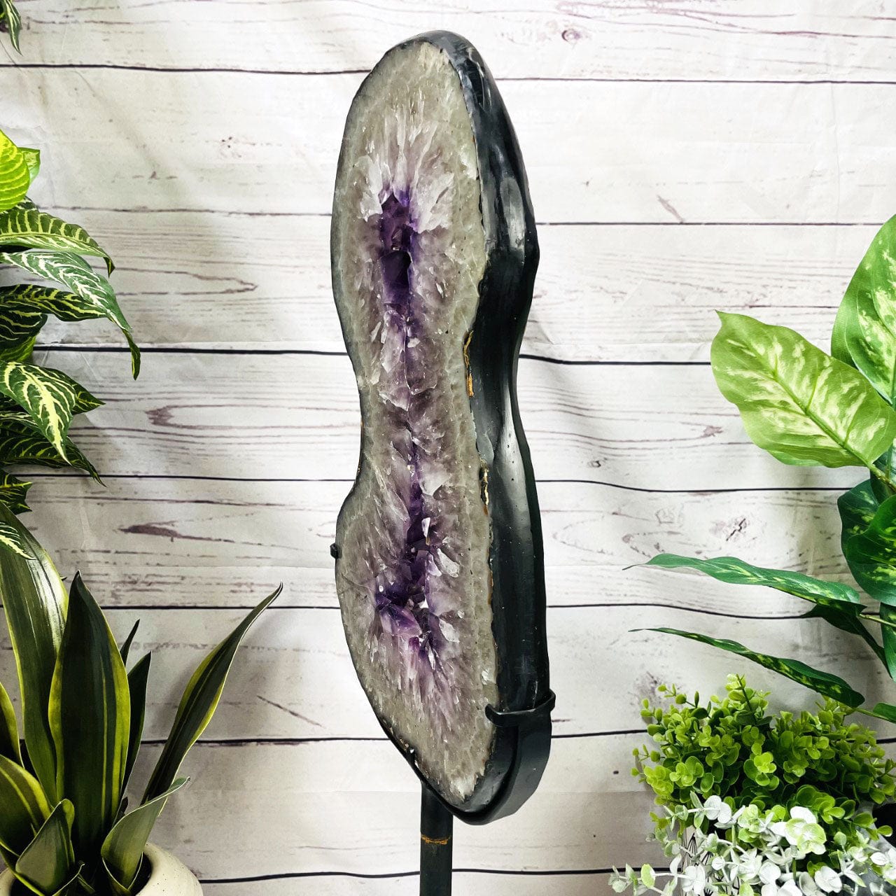 Amethyst Slice in shape of 8 on Metal Stand side view