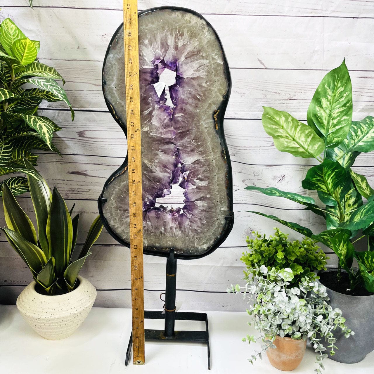 Amethyst Slice in shape of 8 on Metal Stand with a ruler for size