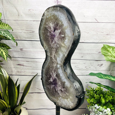 Amethyst Slice in shape of 8 on Metal Stand side view