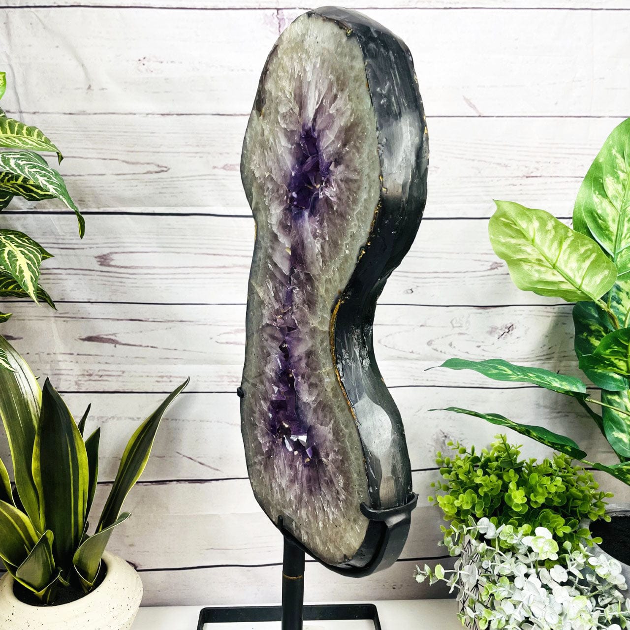 Amethyst Slice in shape of 8 on Metal Stand side view