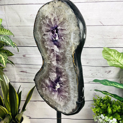 Amethyst Slice in shape of 8 on Metal Stand side view