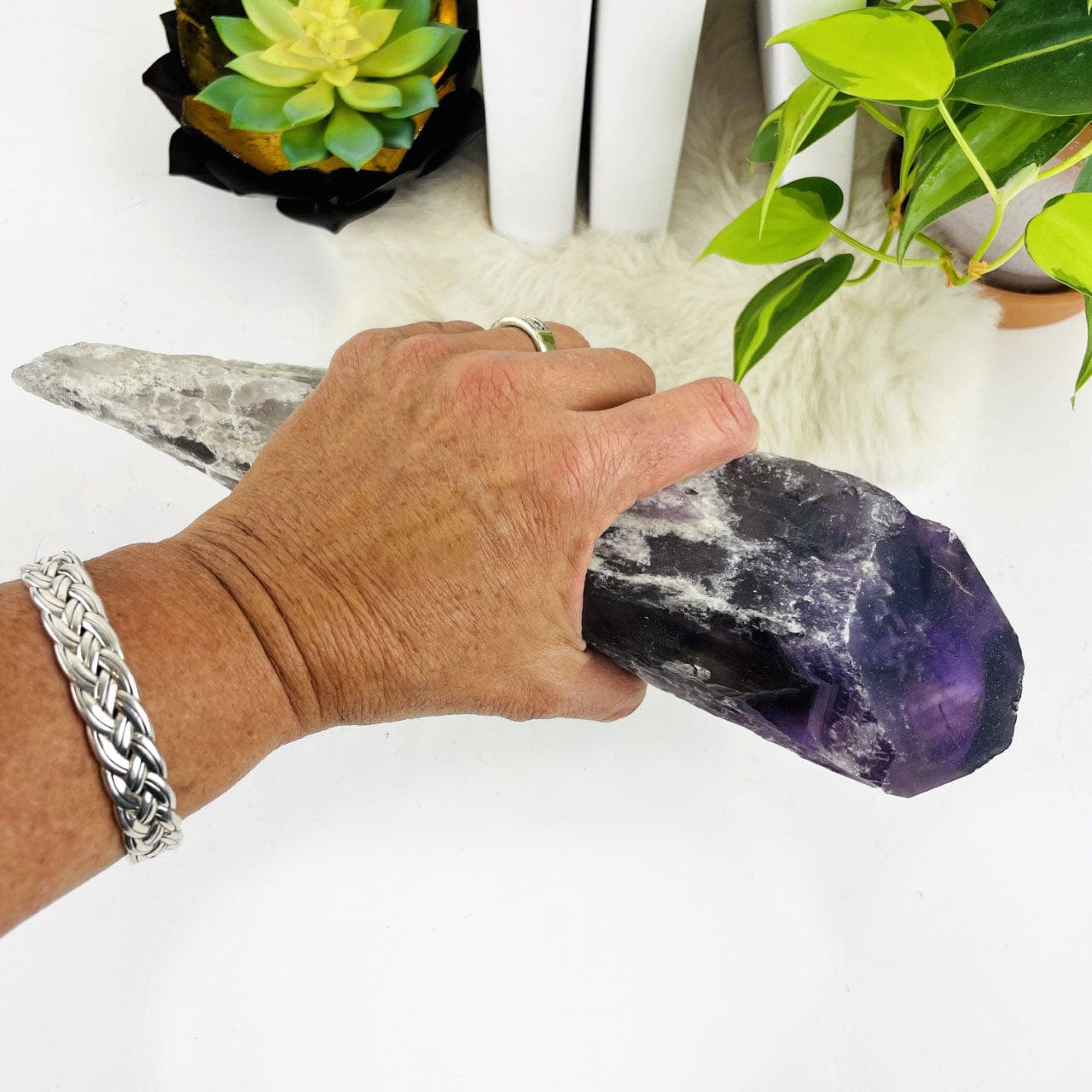 Elestial Amethyst Point in a hand for size