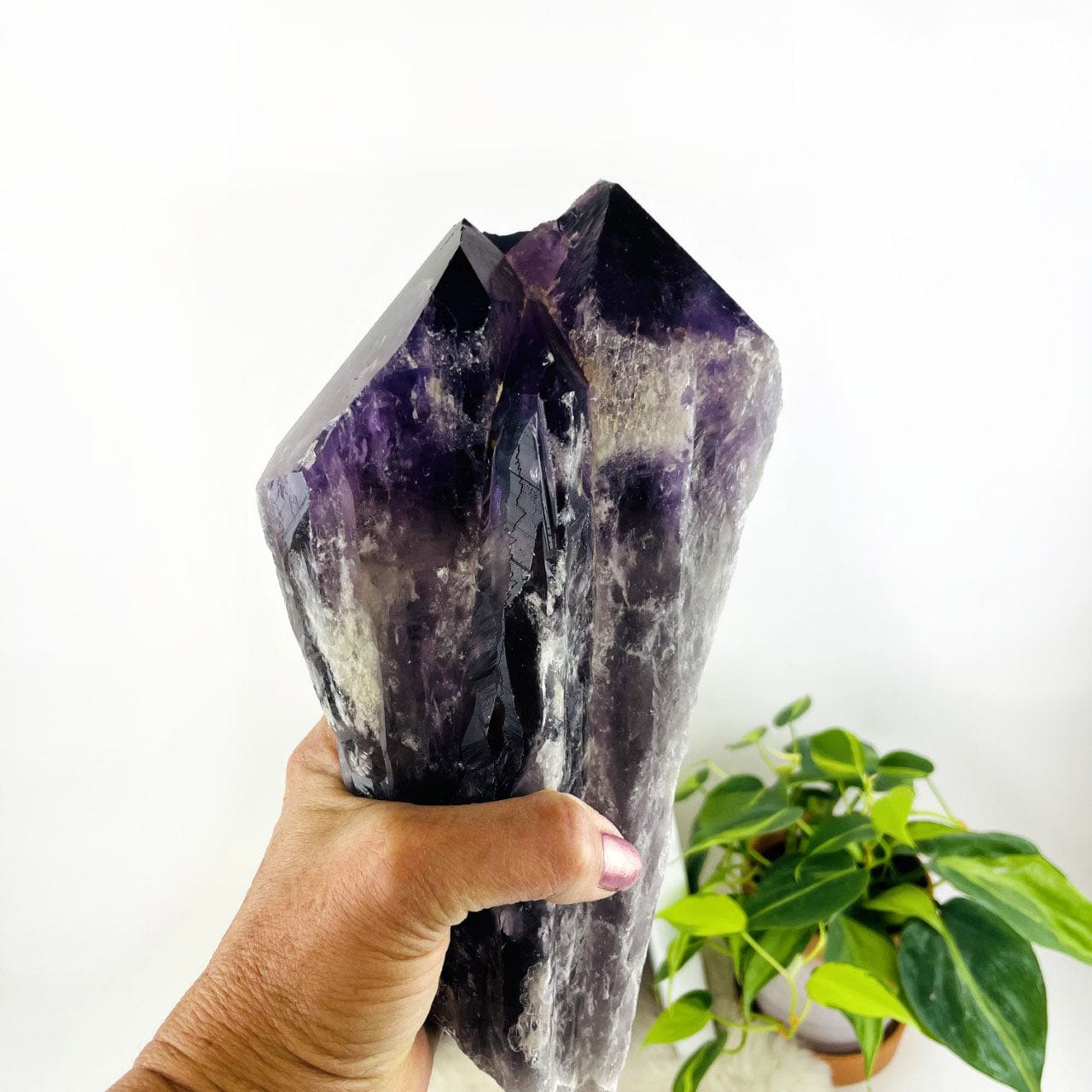 Elestial Amethyst Large Point in a hand up close