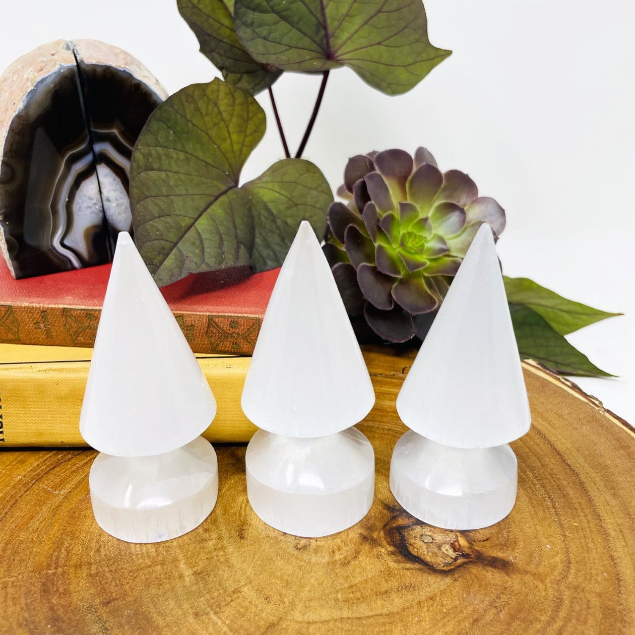 three selenite round spear tips on display for possible variations