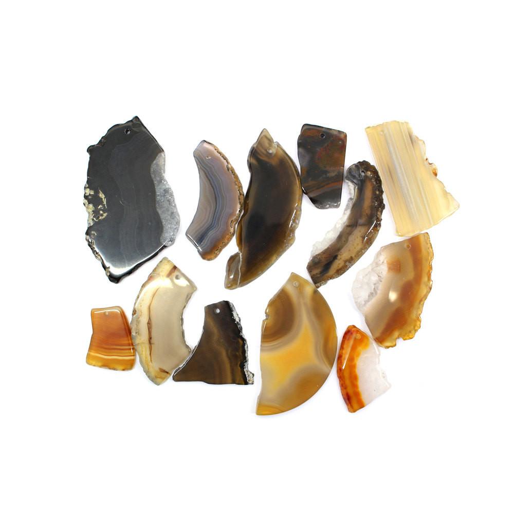 assorted tumbled natural drilled agates.