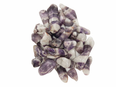 Chevron Amethyst Tumbled Gemstones in a pile on white background