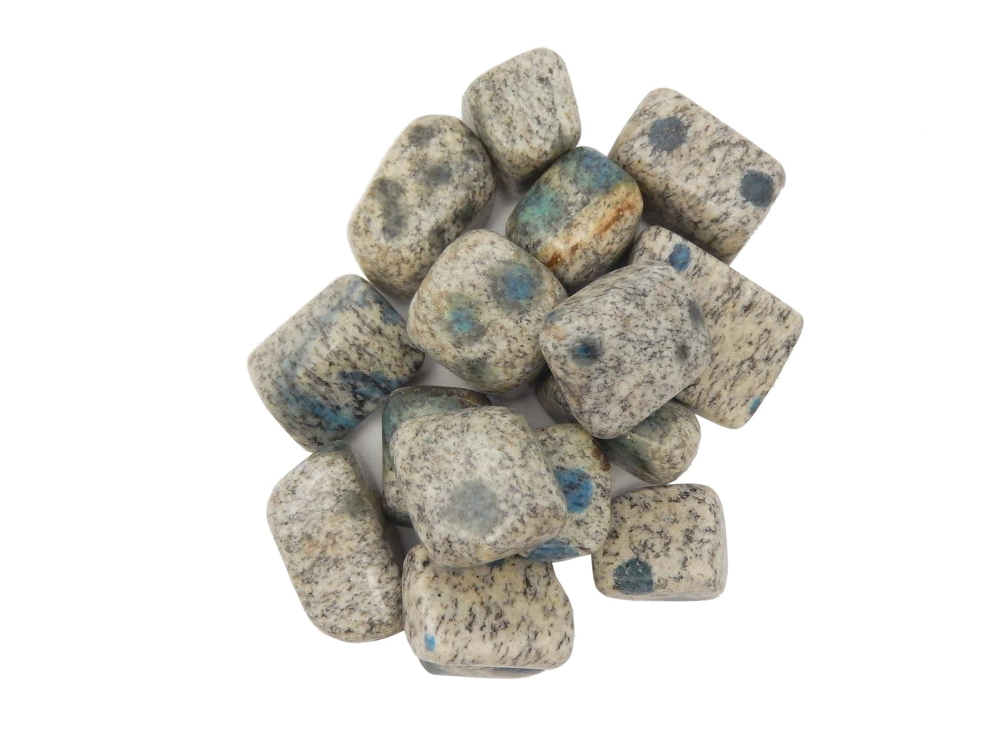 pile of granite/jasper tumbled stones on white background
