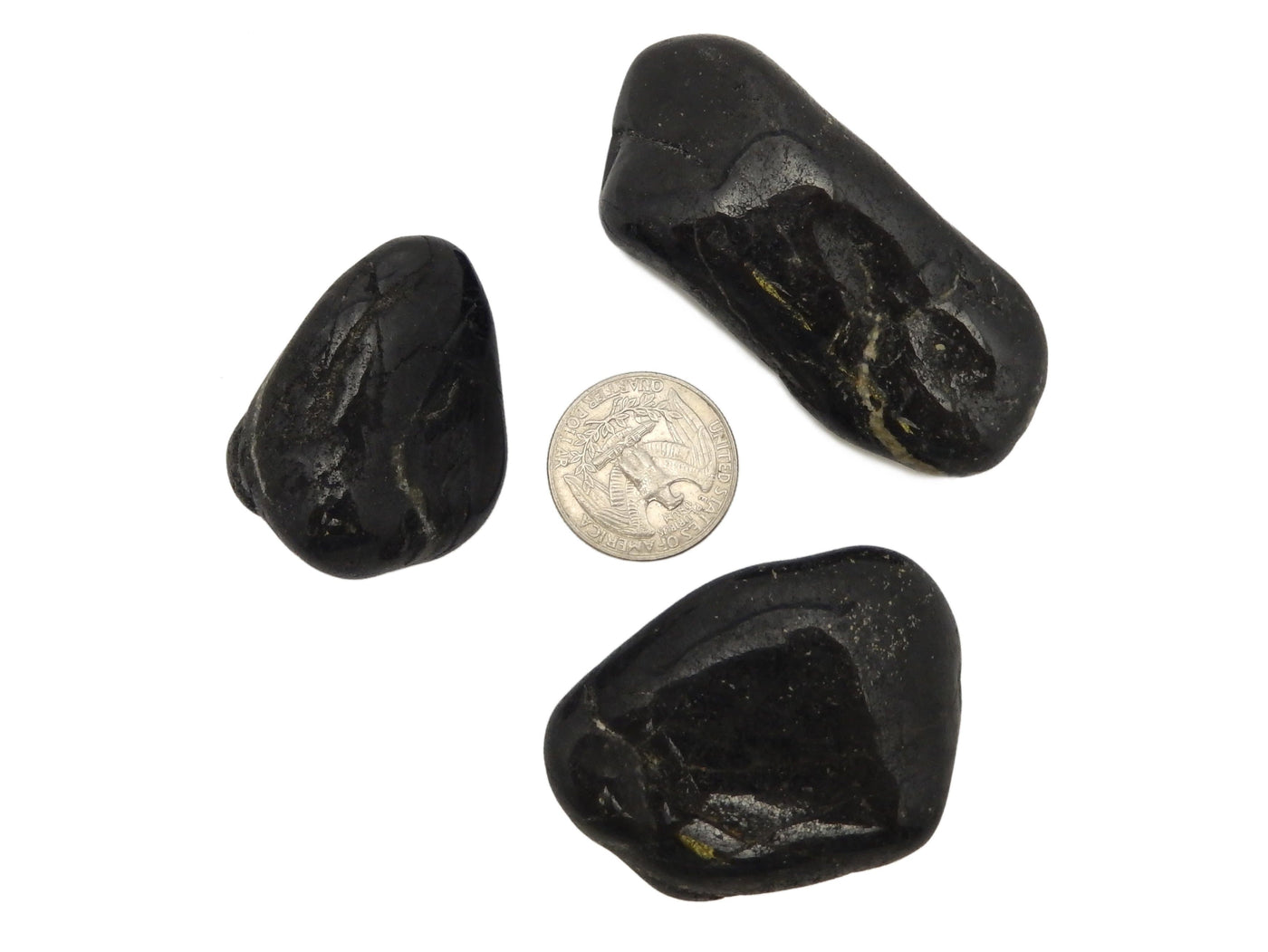 Natural Large Black Tourmaline Tumbled - 3 in a circle with a quarter in the middle
