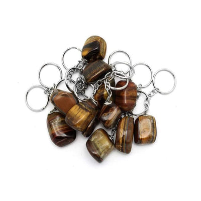 tigers eye tumbled keychains in a pile