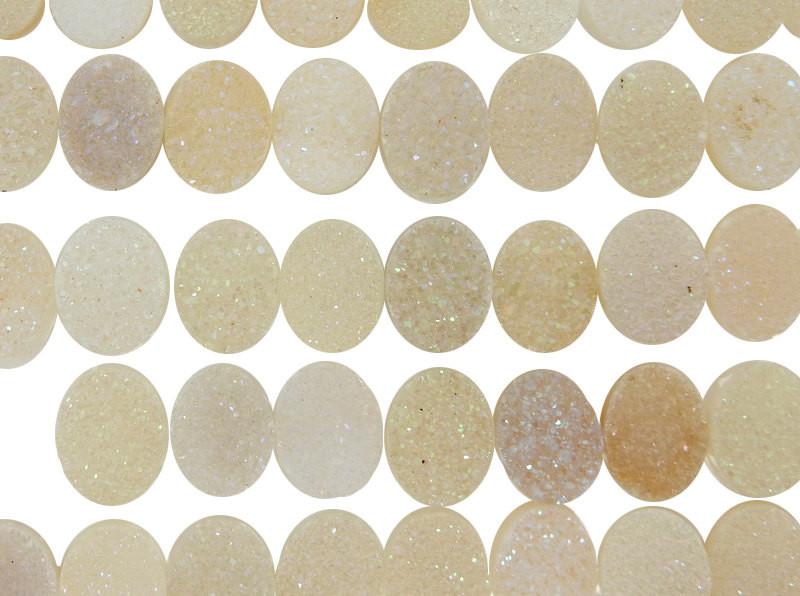 White Shimmer Oval Drusy Cabochon -  different colors in rows on a table