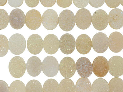 White Shimmer Oval Drusy Cabochon -  different colors in rows on a table