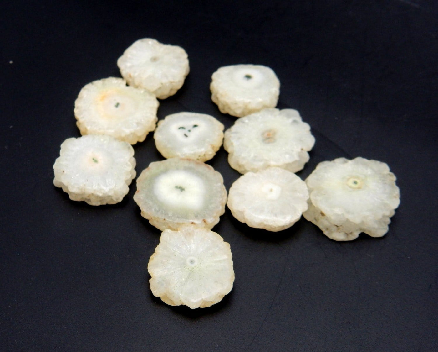 side view of the White Solar Quartz Side Drilled Beads for thickness reference