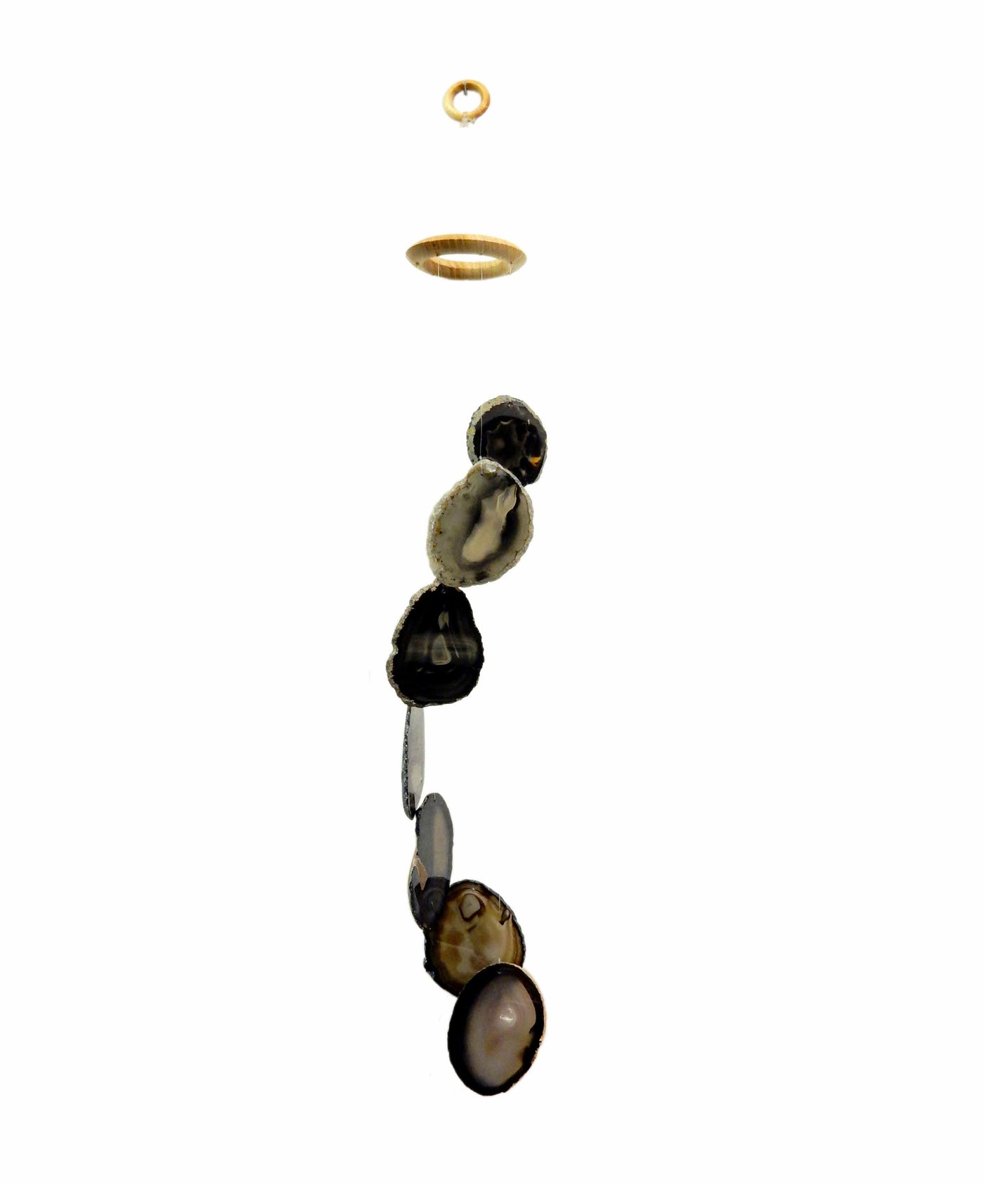 Picture of our black agate windchime hanging, displayed on a white background.