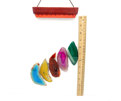 agate wind chime next to a ruler for size reference 