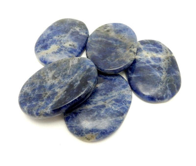 5 sodalite worrystones in a pile
