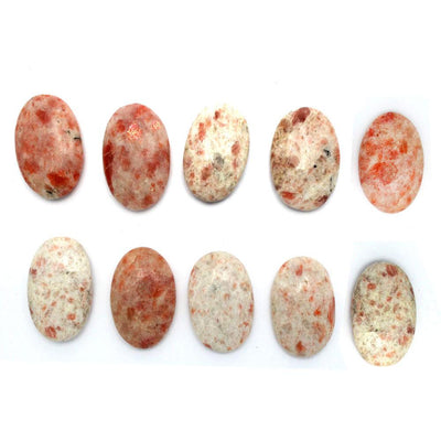 Sunstone Worry Stone displayed to show color variations