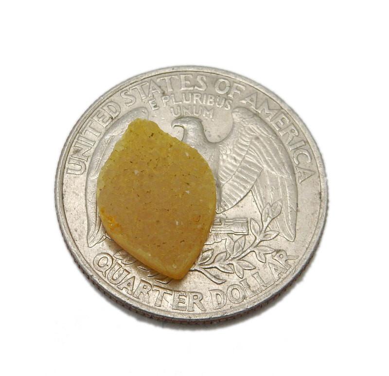 cabochon on a quarter for size reference 